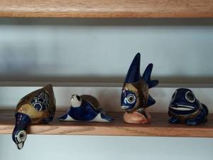 Four Ceramic Hand painted Figurines