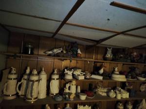 Three Shelves of Bisque Pottery
