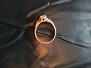 Gold ring with middle square stone