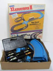 lot 106 image: Working Vintage AURORA XLerators II Slot Car Set wExtra Cars