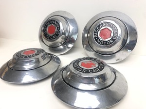 lot 280 image: Matching Set of Vintage Embossed PACKARD Motor Car Company Hubcaps
