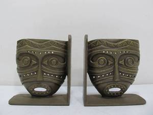 lot 138 image: Heavy Cast Metal Tribal Mask Bookends