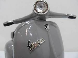 lot 27 image: Limited Edition Diecast Metal Grey Vespa Scooter