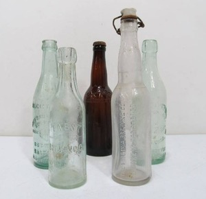 lot 298 image: Early Antique Pre-Prohibition Embossed Glass Beer Bottles