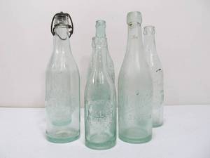 lot 299 image: Early Antique Pre-Prohibition Embossed Glass Beer Bottles