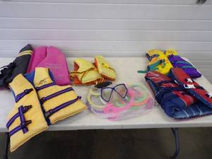 lot 50 image: Life Jackets and water toys
