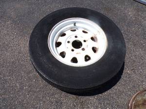 lot 84 image: Trailer Tire Rim with Tire 13
