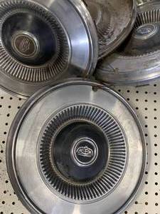 lot 60 image: Lot of Four Ford Torino, Maverick, Comet, Ranchero 1972-76 Hubcaps