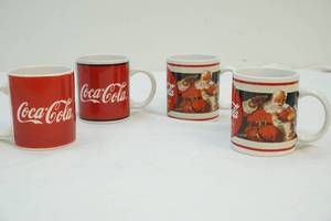 lot 308 image: Coca-Cola mugs