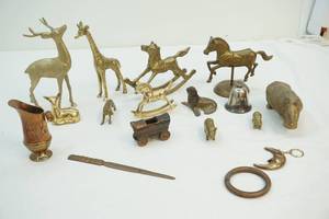 lot 317 image: Brass and brass finished figures