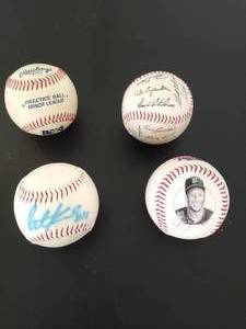 lot 27 image: Four Baseballs