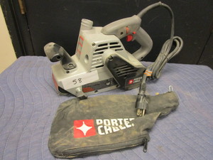 lot 742 image: PORTER-CABLE VARIABLE BELT SANDER W DUST COLLECTION SYSTEM