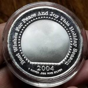 1 TROY OZ. .999 FINE SILVER CHRISTMAS THEME IN AIRTITE
