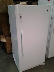 lot 27 image: White GE Upright Freezer with exter...