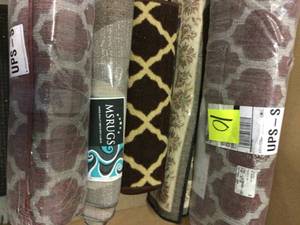 lot 10 image: Lot of assorted Area Rugs various sizes and models not used see pictures