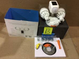 lot 13 image: Ring Flooding Light Cam open box see pictures
