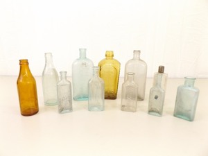 Lot of 11 Antique Snake Oil, etc. Glass Bottles