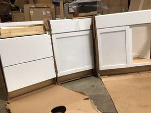 PALLET OF ASSORTED CABINETS BY HAMOTON BAY IN GOOD CONDTION  VARIOUS COLORS  CUSTOMER RETURNS SEE PICTURES
