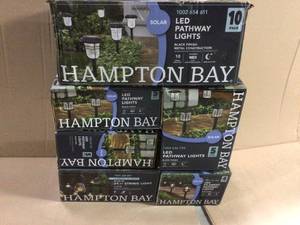 lot 75 image: Solar Powered Black LED Outdoor Integrated 3000K Warm White Landscape Path Light (10-Pack) by Hampton Bay