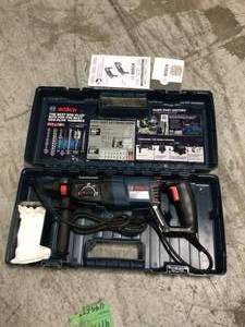 lot 105 image: Bulldog Xtreme 8 Amp 1 in. Corded Variable Speed SDS-Plus ConcreteMasonry Rotary Hammer Drill with Carrying Case by Bosch Customer Returns See Photos