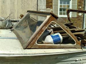 lot 17 image: Vintage wood frame boat.