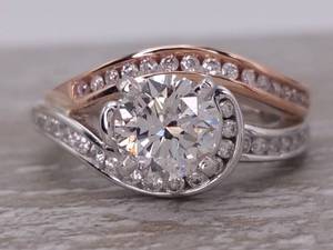 lot 1 image: Stunning 1.39 Carat Diamond Swirl Ring in Two-Toned 14k Gold