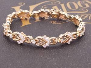 lot 12 image: Fancy 2.65 Carat Diamond Link Bracelet in 14k Gold