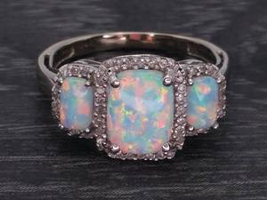 lot 28 image: Brilliant Triple Stone Natural Fire Opal and Diamond Halo Estate Ring in 14k Gold