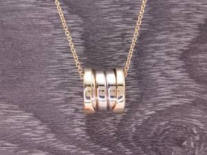 lot 8 image: BVLGARI B.zero1 Four-Band Estate Necklace and Pendant in Yellow Gold