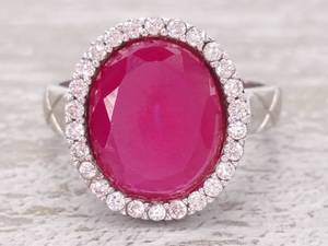 lot 64 image: Large Ruby Halo Estate Statement Ring