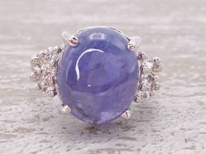 lot 66 image: Large Natural Tanzanite and White Sapphire Estate Ring