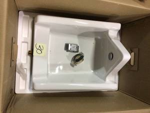 lot 30 image: Washbrook FloWise Top Spud 0.125 GPF Urinal in White by American Standard &nbspCustomer Returns See Pictures