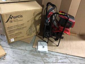 lot 56 image: 12 in. 9 Amp Corded Electric TillerCultivator with 3-Position Wheels by Mantis &nbspCustomer Returns See Pictures