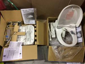 lot 88 image: WASHLET C100 Electric Bidet Seat for Round Toilet with PREMIST in Cotton White by TOTO&nbspCustomer Returns See Pictures
