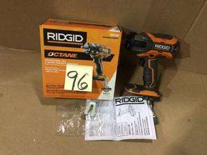 lot 96 image: 18-Volt OCTANE Cordless Brushless 12 in. Impact Wrench (Tool Only) with Belt Clip by RIDGID &nbspCustomer Returns See Pictures