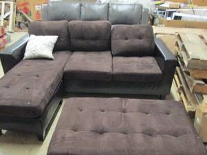 lot 9 image: L shaped couch missing legs for big...