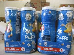 8 Containers of Gerber Puffs expir...