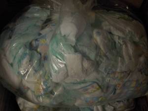 Bag of 100 or so Diapers newborn-3...