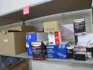 Shelf of Assorted Printer Cartridge...