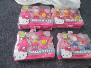 4 Hello Kitty Mini Dolls...