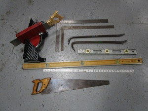 lot 87 image: Saws, Squares, Pry Bars & Levels