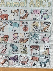 lot 129 image: Adorable Framed Alphabet Cross-Stitch