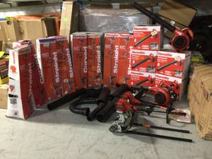 lot 8 image: Mix pallet of assorted Homelite Straight shaft trimmers & 2 cycle Gas blowers