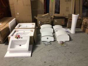 lot 11 image: Mix Pallet of Toilet Tanks ans sinks diferents styles and conditions (brands include american standard, swiss madison)