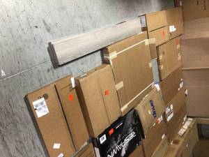 lot 16 image: Mix pallet of assorted Shelving, Closet Systems and Cabinets (for parts) see pictures