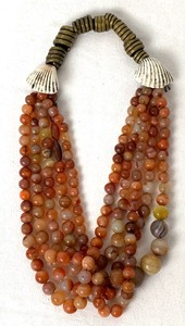 lot 219 image: Antique Carnelian Agate African Trade Bead Necklace with Glass Beads, Shells and Metal Rings