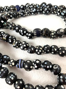 lot 221 image: Late 19thEarly 20th Century Ethiopian Skunk Beads