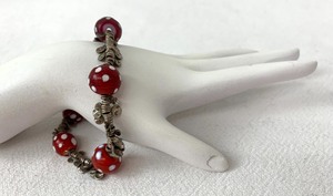 lot 195 image: Me & Ro Brand Ethiopian Skunk Bead Bracelet w Sterling Silver Charms