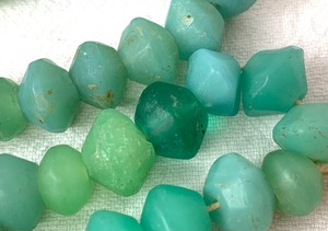lot 196 image: Antique Bohemian Blue-Green Molded Vaseline Beads - African Trade