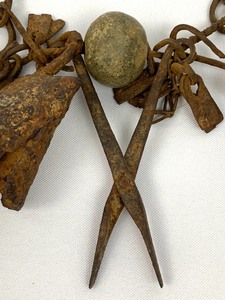 lot 227 image: Antique Dogon Hogan Forged Iron Necklace with Sacred Dougue Covenant Stone and Amulets From Mali